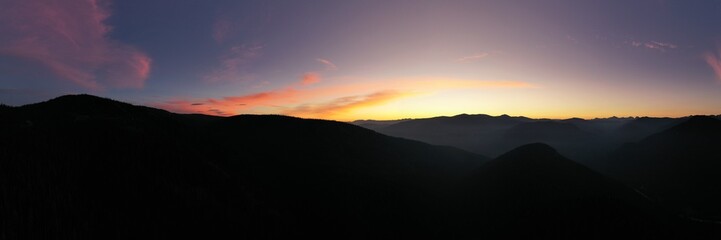 Stunning aerial mountain top sunrise