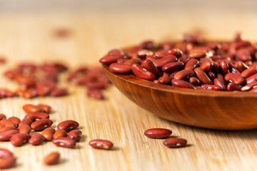  grains  of red bean in a wooden bowl