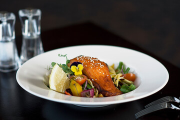 Salmon served with salad Delicious restaurant food Healthy food