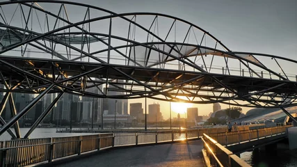 Fototapete Helix-Brücke Sonnenuntergang im Geschäftszentrum von Singapur. Helix-Brücke