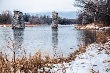The poles of the old bridge in Ontario