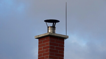 Brick chimney and lightning conductor