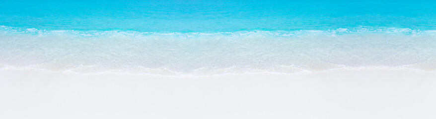 Tropical beach scene of azure crystal sea with soft waves. Long banner