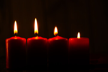 Candles in the dark. Candles Burning in the Dark with lights glow