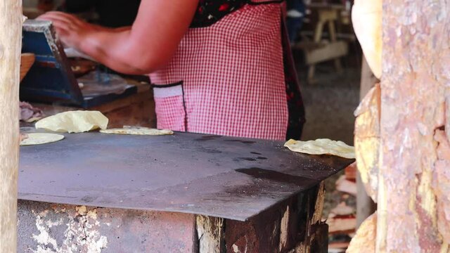 Authentic mexican comal and preparing of tortillas 