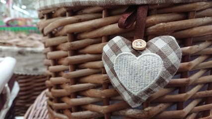 Wonderful and cute tissue heart attached to a braided basket