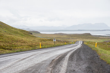 muddy gravel road on the icelandic countryside of Snaefellsnes