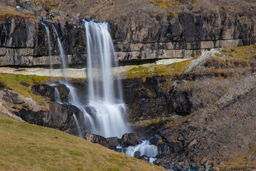 Waterfall Bergarfoss in Hornafjordur in south Icelandic countryside