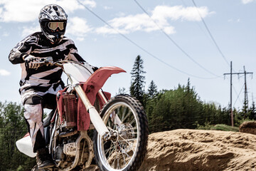 dirt bike motocross rider jump on the air Alberta sand dunes