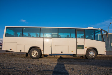White bus on a parking lot