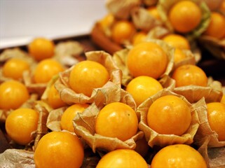 Closeup yellow Peruvian groundcherry ,berry seeds ,golden berry gigante fruits for background ,macro image and detail	