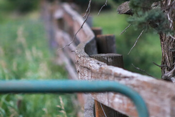 Close up of old wooden fence in pasture
