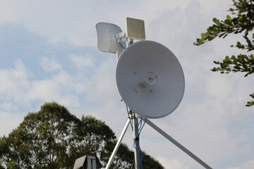 Internet parabolic antennas are used to transmit virtual data