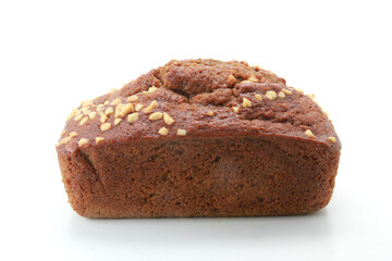 Banana bread with walnuts on white background