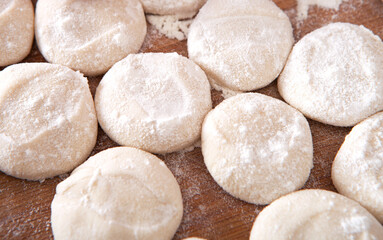 Fototapeta na wymiar Prepare the dough for making dumplings