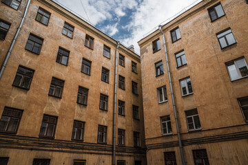 Facade of an old gloomy stone house
