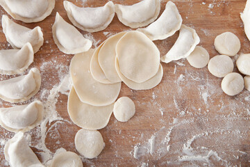 Looking down on the dumplings and dumpling wrappers
