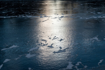 Sun reflection on a frozen lake