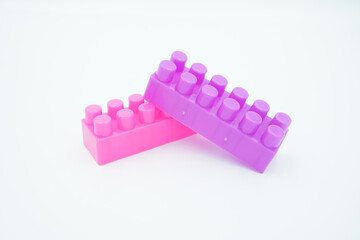 colored stacking blocks on a white background