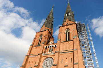 Fototapeta na wymiar Uppsala cathedral in Sweden with a blue sky background