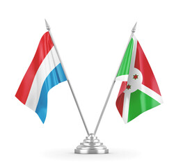 Burundi and Luxembourg table flags isolated on white 3D rendering