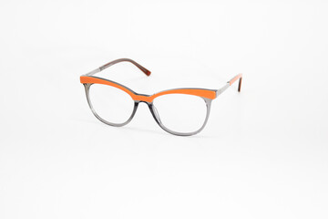 Optic glasses white background orange frame
