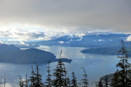 A beautiful view of the ocean and islands below of howe sound from the bowen lookout trail on Cypress Mountain, outside Vancouver, British Columbia, Canada