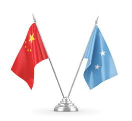 Micronesia and China table flags isolated on white 3D rendering