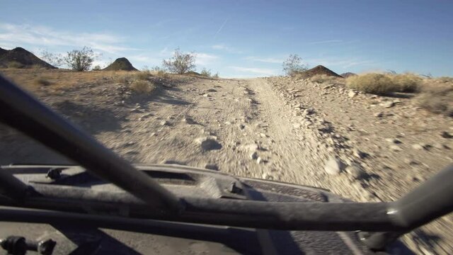 Driving with a quad 4x4 atv at dirt roads at Quartzsite, AZ, USA.