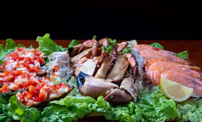 seafood served with salad - selective focus.