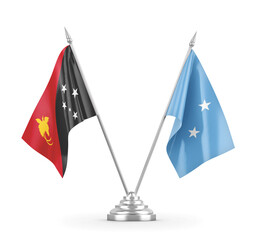 Micronesia and Papua New Guinea table flags isolated on white 3D rendering