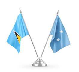 Micronesia and Saint Lucia table flags isolated on white 3D rendering