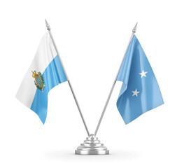 Micronesia and San Marino table flags isolated on white 3D rendering