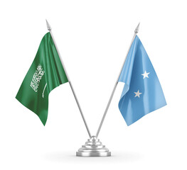 Micronesia and Saudi Arabia table flags isolated on white 3D rendering