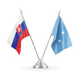 Micronesia and Slovakia table flags isolated on white 3D rendering