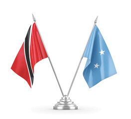 Micronesia and Trinidad and Tobago table flags isolated on white 3D rendering