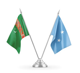 Micronesia and Turkmenistan table flags isolated on white 3D rendering