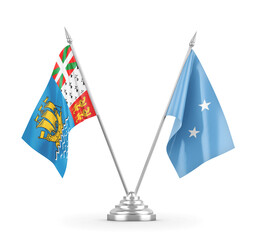 Micronesia and Saint Pierre and Miquelon table flags isolated on white