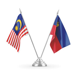 Liechtenstein and Malaysia table flags isolated on white 3D rendering