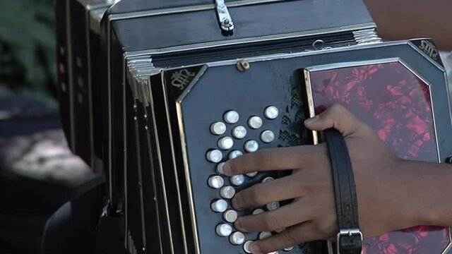 A Bandoneon Tango Player in Buenos Aires, Argentina. Close Up.  
