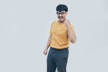Fototapeta premium adult asian man.young male wear eye glasses.posing smiling look excited surprised thinking positive happy joy life.empty,copy space for text advertising.white background.attractive fashion people