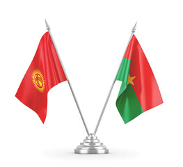 Burkina Faso and Kyrgyzstan table flags isolated on white 3D rendering