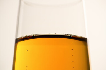 Close-up of a glass of white wine, beer, champagne on a gray background. New year and Christmas background. Valentine's Day.