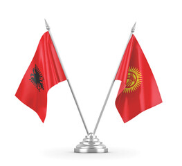 Kyrgyzstan and Albania table flags isolated on white 3D rendering 
