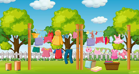 Many clothes hanging on a line outside the house scene