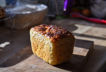 freshly baked homemade bread is on the table in the home kitchen