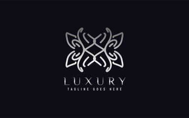 Luxury Logo Design. Elegant Symbol with Geometric Modern Lines Combination. Usable For Business, Community, Foundation, Services, Company. Vector Logo Design Illustration.