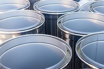 Goods in the warehouse. Shiny modules or fragments of stainless steel pipes for chimneys. Modular chimney, close-up