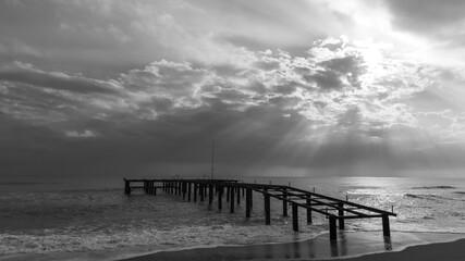 beach pier and dramatic seascape view