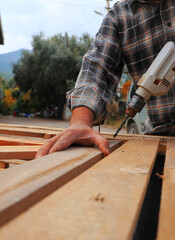 carpenter working on the wood